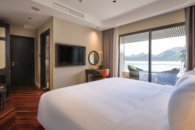 2 Days 1 Night Discovery Halong Lan Ha Bay Group for 2 adults - Day 2: sunrise, tai-chi, then Dark and Bright cave by rowing boat