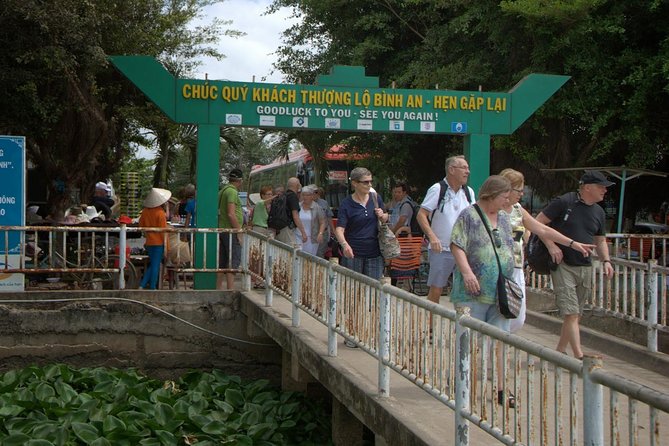 Cai Be Mekong Delta Tour: Cooking Class, Cycling & Craft Villages - Boat trip back to Cai Be: the calmer close before Ho Chi Minh City