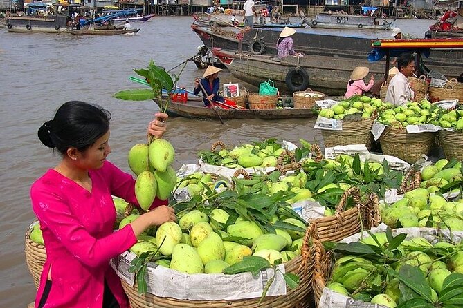 Cai Rang Floating Market & Mekong Delta 2-Day Tour from HCM City - Day 1: Vinh Trang Pagoda and Ben Tre’s coconut production stops