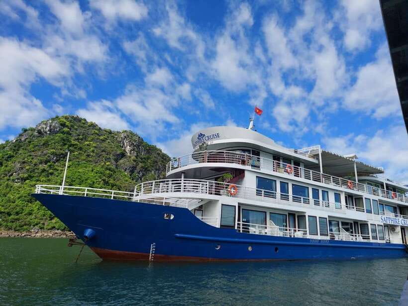From Hanoi: 2-Day Halong Sapphire Cruise with Balcony Cabin - Day 2: Tai Chi at Dawn, Dark & Bright Cave by Local Boat/Kayak, and Back to Hanoi