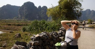 From Hanoi: Hoa Lu & Tam Coc with Buffet lunch & Cycling - Tam Coc Sampan Ride: Where Limestone Caves Make Time Feel Slower