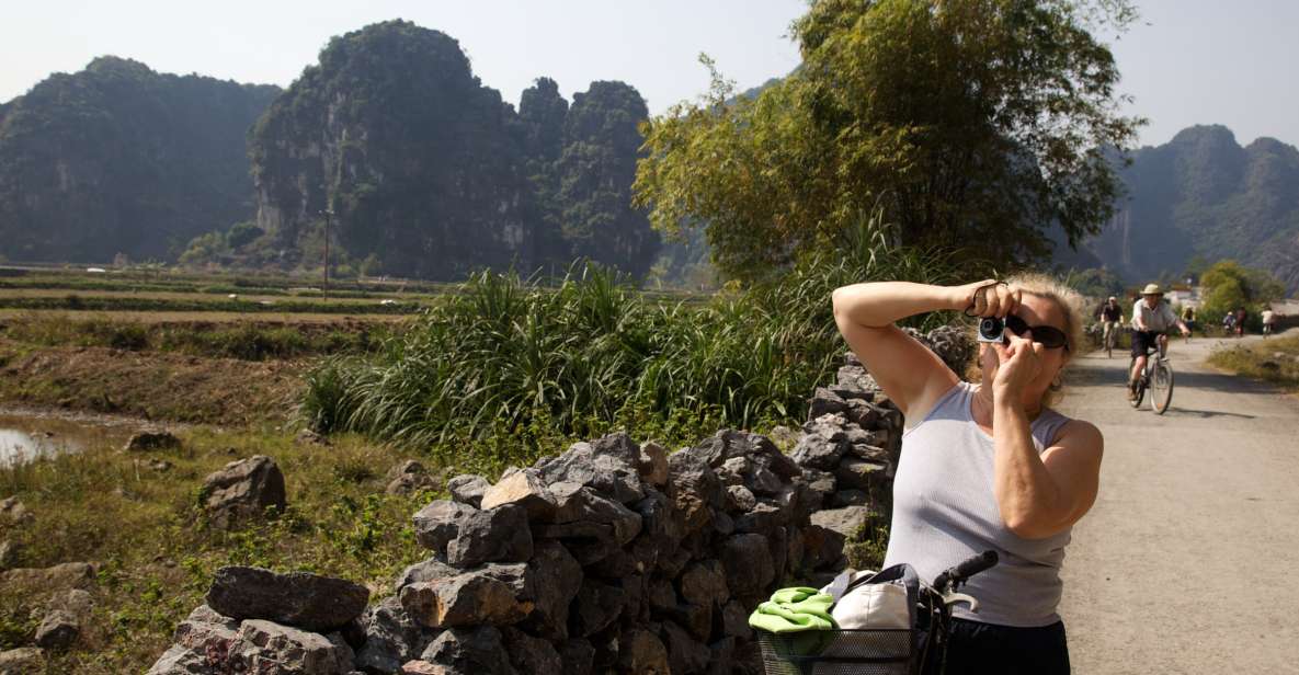 From Hanoi: Hoa Lu & Tam Coc with Buffet lunch & Cycling - Tam Coc Sampan Ride: Where Limestone Caves Make Time Feel Slower
