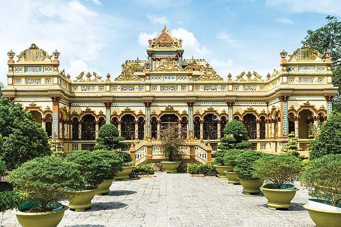 From HCM City: Mekong Delta Tour with Sampan Journey - Vinh Trang Pagoda: The Calm Temple With Three Cultural Flavors