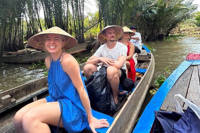 From HCM City: Mekong Delta Tour with Sampan Journey - Sampan Ride Through Coconut Canals: Slow Boats, Soft Light, and Comfort Choices