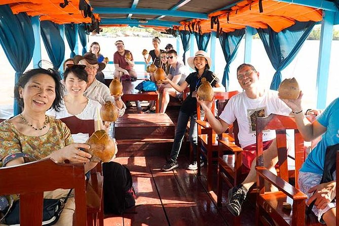 From HCM City: Mekong Delta Tour with Sampan Journey - Unicorn Islet Village: Fruits, Honey Tea, Folk Music, and Optional Oddities