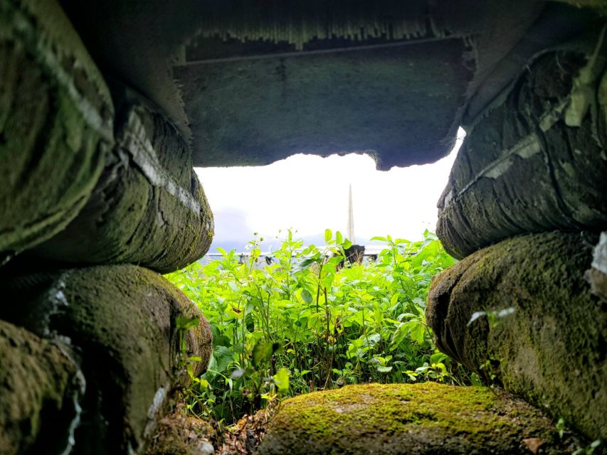 From Hue: DMZ Tour with Vinh Moc Tunnels and Khe Sanh Base - Paco minority village chance stop: small moments in the broader story