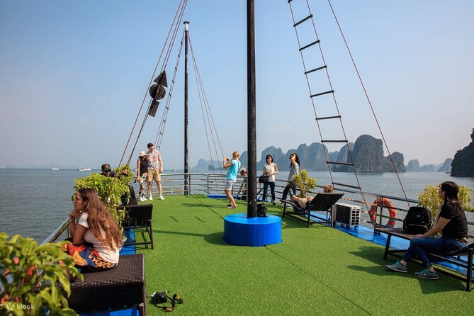 Ha Long Bay Cruise Day Tour-Cave, Kayaking,Ti top island & Lunch - Cruising Ha Long Bay: karst views with a reality check