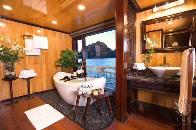 Halong Bay - Hera Cruise - All Inclusive Multi Days Tour - Day 2 sunrise routine: tai chi, breakfast, then Luon again