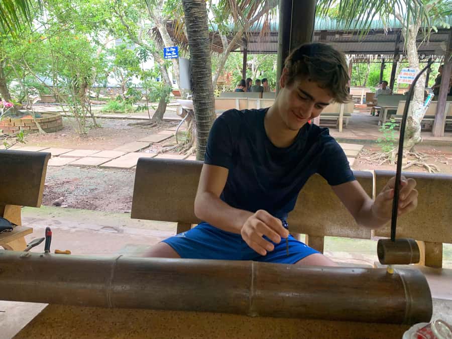 HCM: Authentic Mekong Delta - Boat, TukTuk, Khot Cake Making - Coconut Candy Making and How Crafts Become a Living