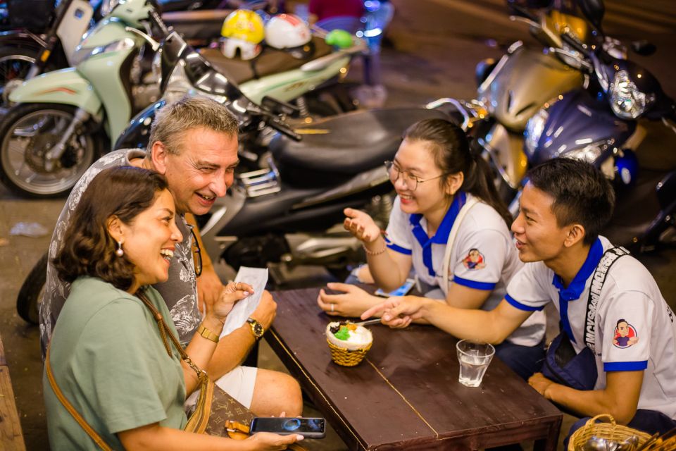 Ho Chi Minh City: Private Street Food Motorbike Tour - Old buildings, a pagoda inside an apartment, and the night flower market