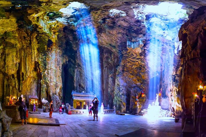 Lady Buddha, Marble Mountains, Coconut Jungle & Hoian City Tour - Marble Mountains caves and Buddhist pagodas: stairs, shelter, and optional elevator
