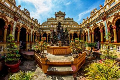 Mekong Delta Small Group Full Day Tour - Vinh Trang Temple: A Pagoda Stop With European Meets Asian