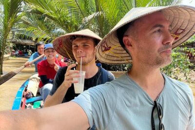Mekong Delta tour: My Tho - Ben Tre 1 day by DGT - My Tho harbor to sampans: fruits, honeybee tea, and the canal “up close” moment