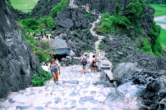 Ninh Binh Full-Day Tour from Hanoi to Hoa Lu, Tam Coc & Mua Cave Via Boat & Bike - Mua Cave on Lying Dragon Mountain: The 500-Step Energy Check