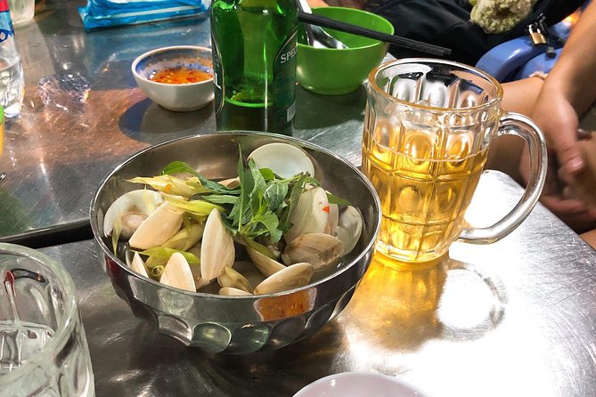 Saigon By Night and Street Food By Motorbike | Opt: Ao Dai Riders - Motorbike Safety: Helmets, Ponchos, and the First Minutes