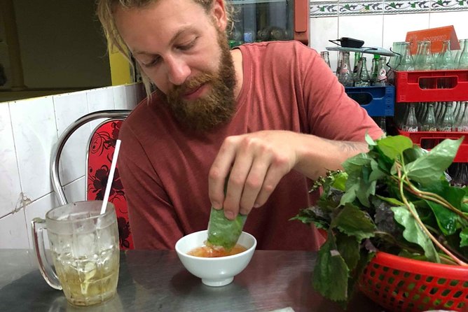 Saigon By Night and Street Food By Motorbike | Opt: Ao Dai Riders - Stop 2: District 10 Flower Market Area and Seafood That Goes Big